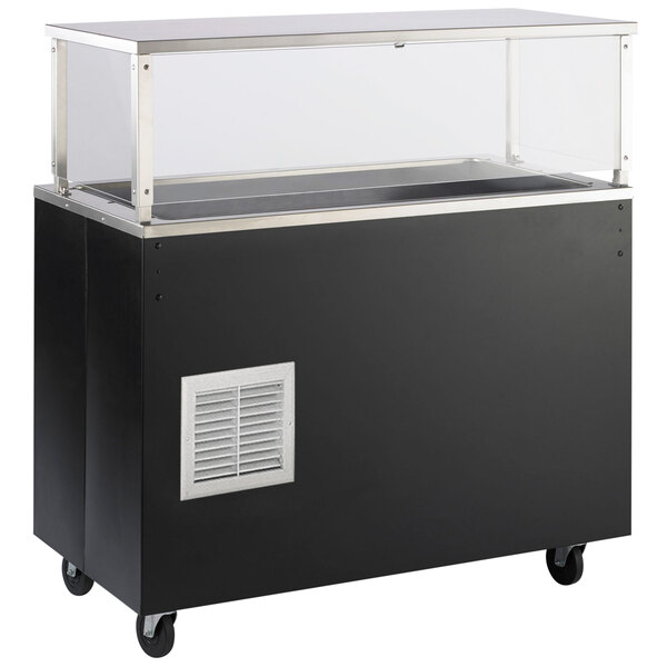 A black Vollrath refrigerated cold food station with a glass breath guard on a counter.