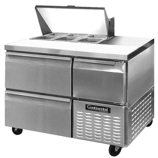 A Continental Refrigerator stainless steel sandwich prep table with two drawers.