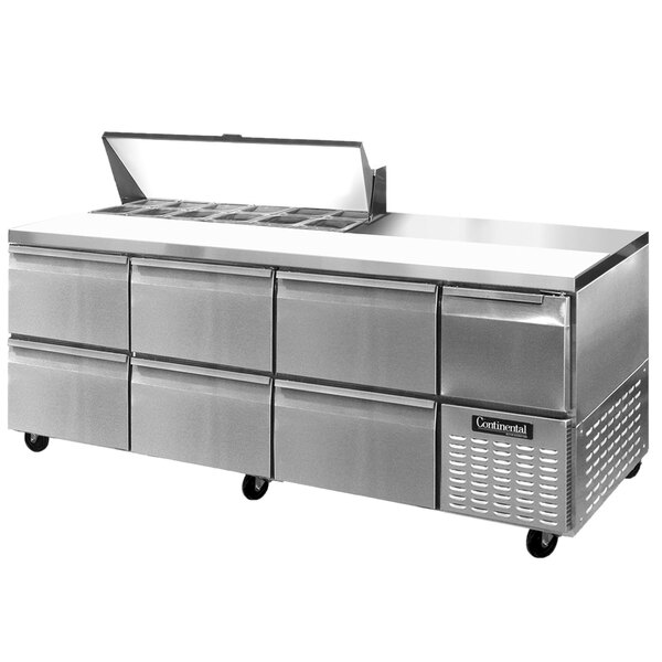 A Continental Refrigerator stainless steel sandwich prep table with drawers.