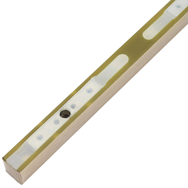 A long gold metal rectangular seal bar with two holes in it.