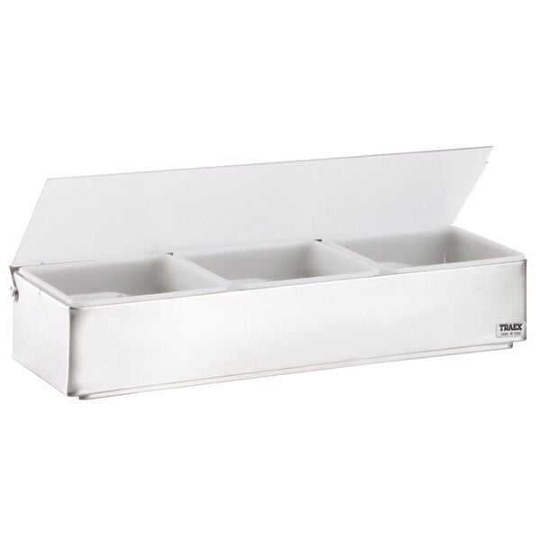 A Vollrath stainless steel condiment bar with three compartments.