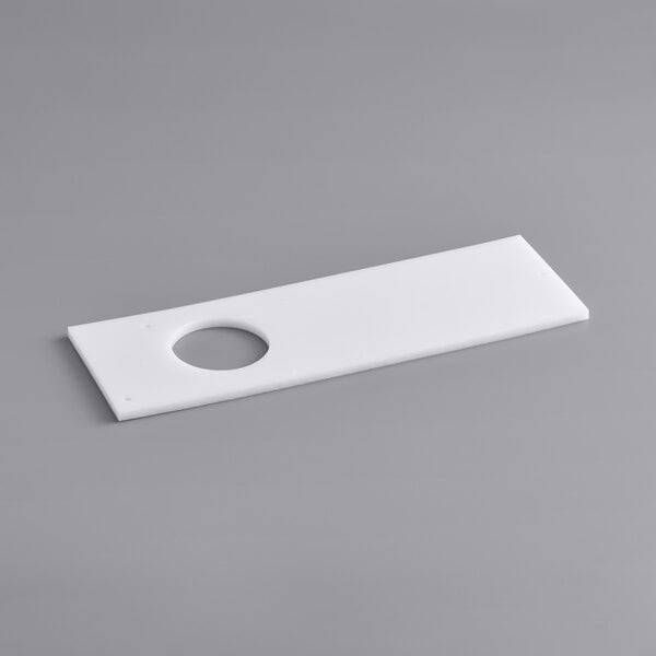 A white rectangular tray with a grey circular hole in the center.