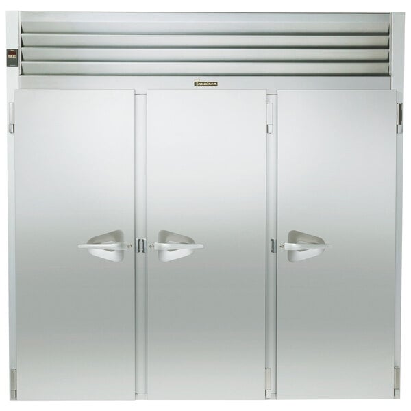 The open door of a Traulsen stainless steel refrigerator.
