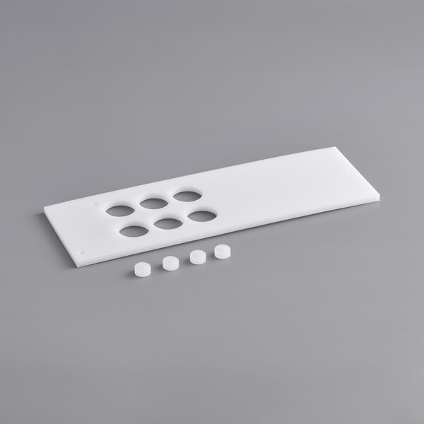 A white rectangular plastic tray with small round bumpers.