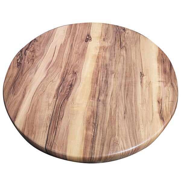 An American Tables & Seating round Indian rosewood table top.