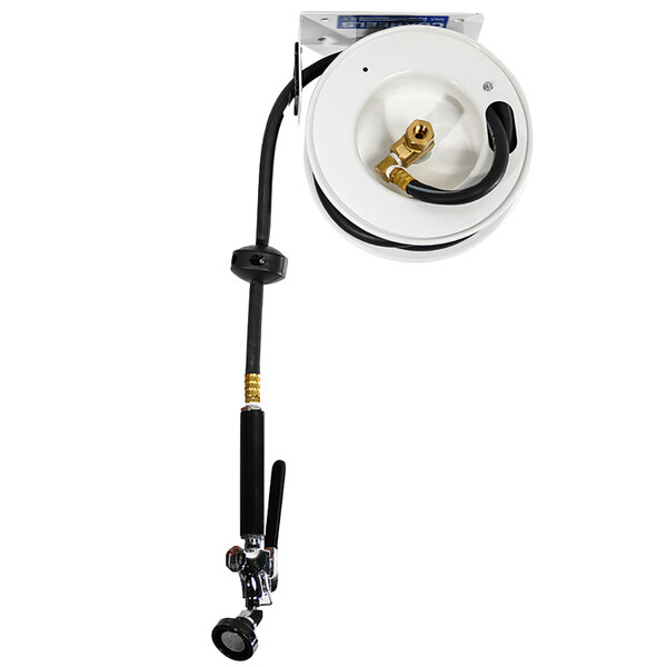 A Fisher undercounter mounted hose reel with a hose attached.