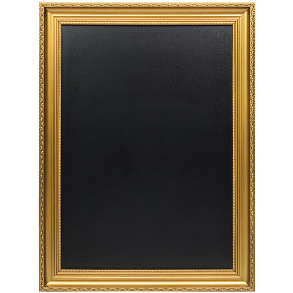 An American Metalcraft blackboard with a gold frame.