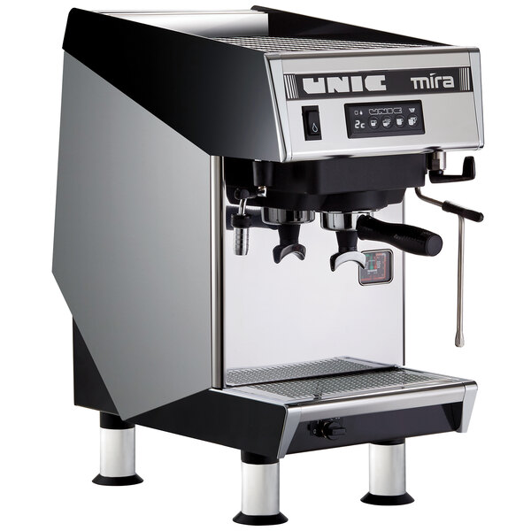 A silver and black Unic Mira automatic espresso machine.