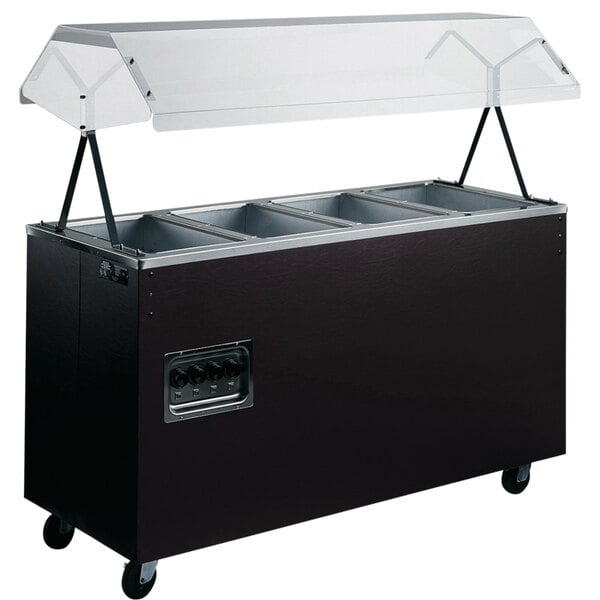 A black Vollrath hot food cart with clear covers over wells.