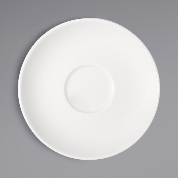 A white Bauscher porcelain saucer with a circle on it.