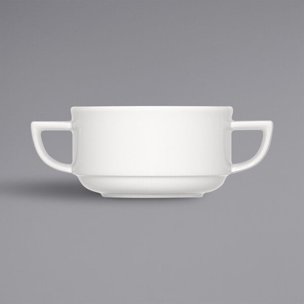 A close up of a Bauscher bright white porcelain soup cup with two handles.