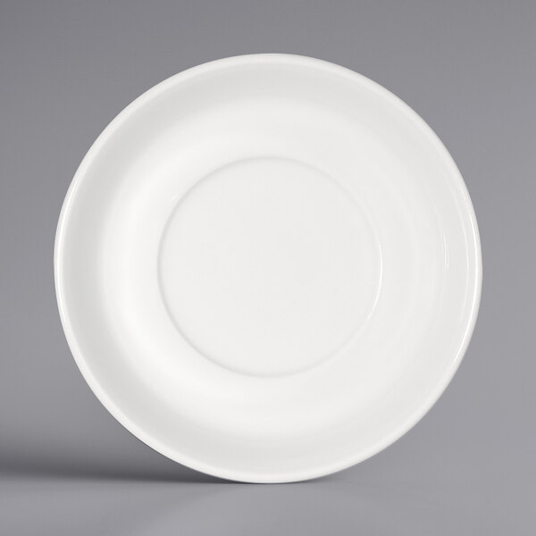 A close-up of a Bauscher white porcelain saucer with a small rim.