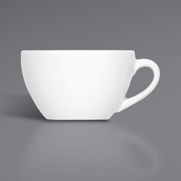 A Bauscher bright white porcelain espresso cup with a handle.