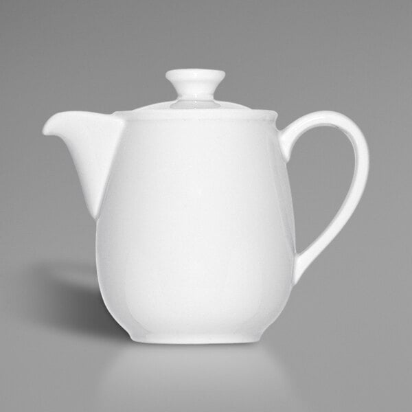 A Bauscher bright white porcelain coffee pot with a lid and handle.