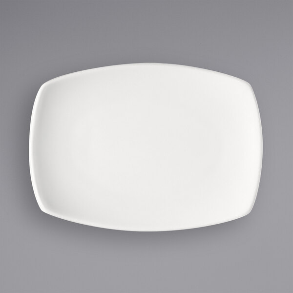 A Bauscher bright white rectangular porcelain coupe platter on a white background.