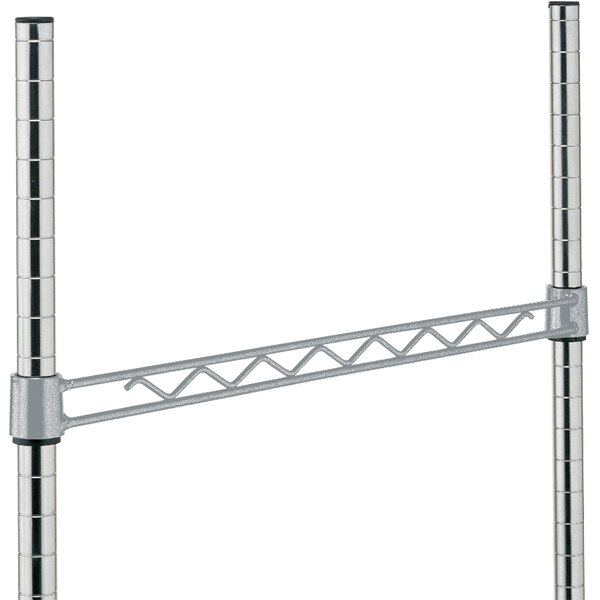 A metal frame with a silver metal rail attached to it.
