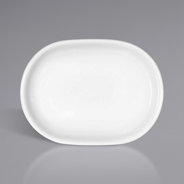 A bright white oval porcelain dish with a small rim.