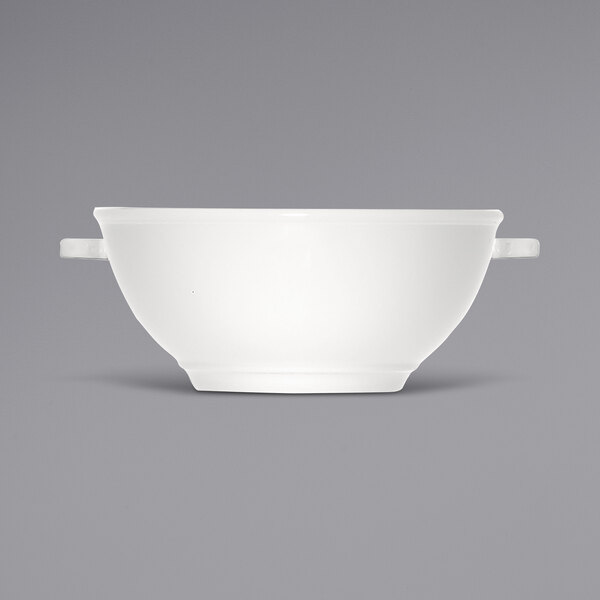 A bright white porcelain tureen with handles.