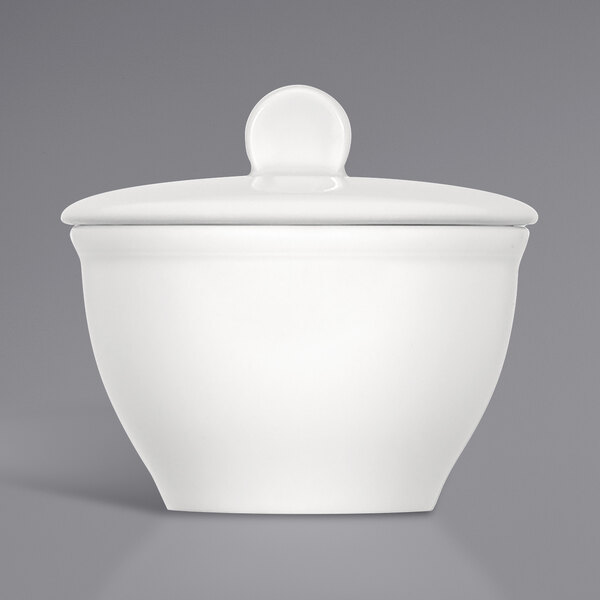 A Bauscher bright white porcelain sugar bowl with a lid.