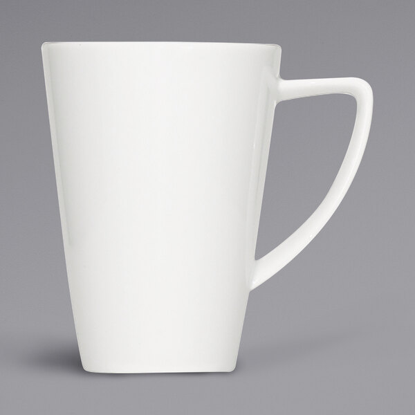 A close-up of a Bauscher bright white porcelain cup with a handle.
