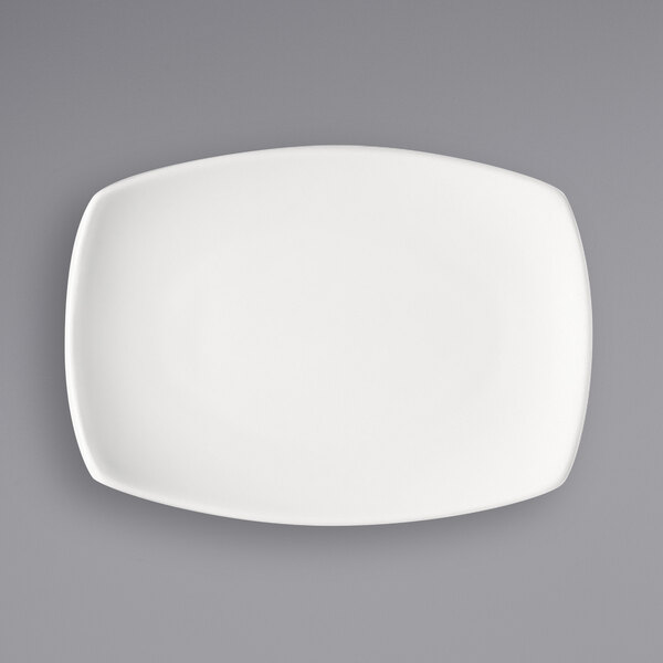 A Bauscher bright white rectangular porcelain coupe platter on a white background.