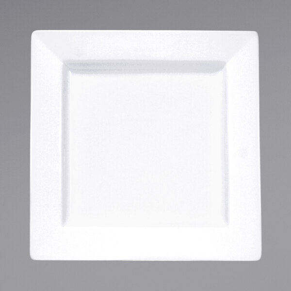 A white square porcelain plate with a white rim.