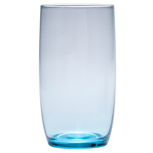 A close up of a clear Fortessa beverage glass with a blue rim.