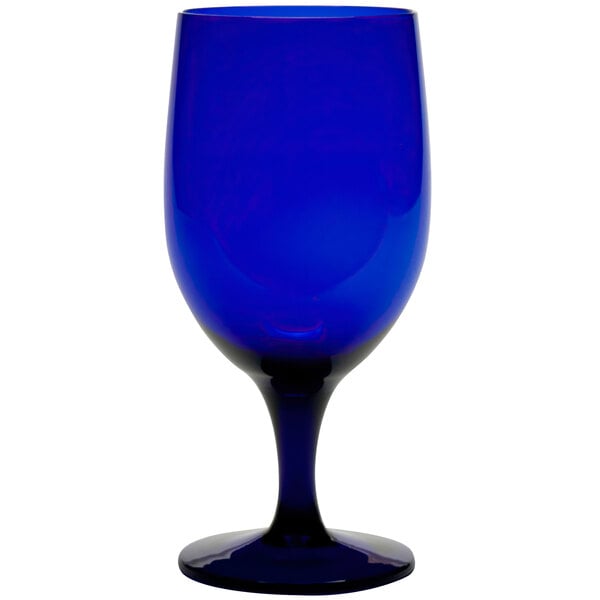 A close-up of a Fortessa dark cobalt blue wine glass.