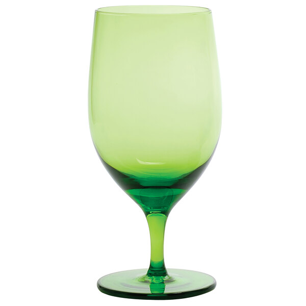 A close-up of a Fortessa olive green wine glass with a stem.