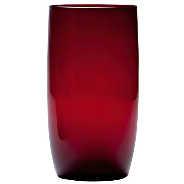 A close-up of a Fortessa ruby red beverage glass.