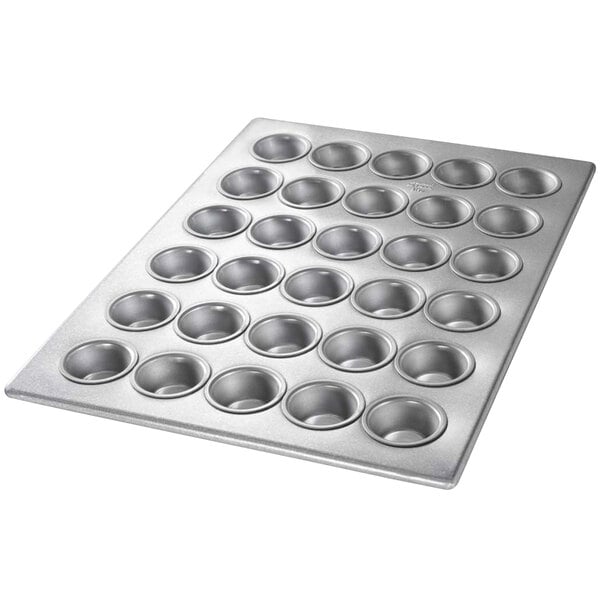 A Chicago Metallic mini muffin pan with 30 holes.