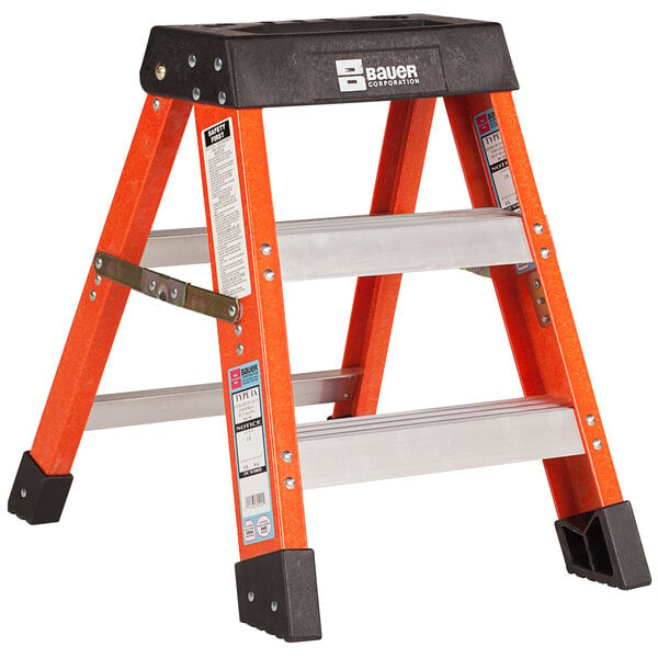 A Bauer 2' safety orange fiberglass step ladder with black top and legs.