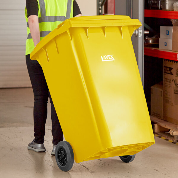 Lavex 95 Gallon Yellow Wheeled Rectangular Trash Can with Lid