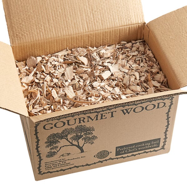 A cardboard box with hickory wood chips.