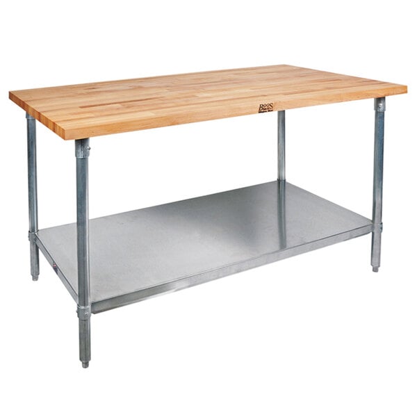 A John Boos wood top work table with a galvanized metal base and adjustable metal undershelf.