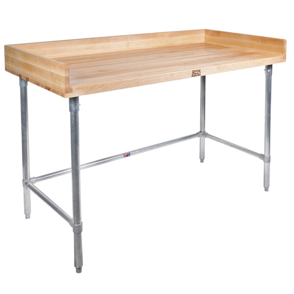 A wood table with metal legs.
