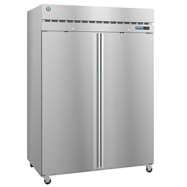 A silver Hoshizaki pass-through refrigerator with stainless steel doors.
