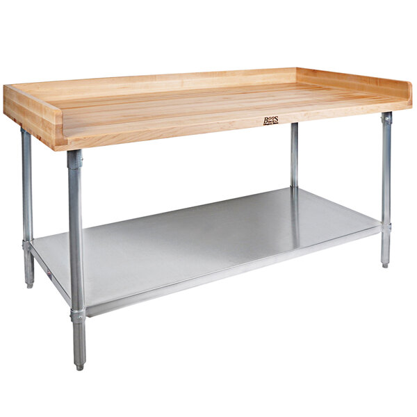 A wood baker's table with a galvanized metal base and adjustable metal undershelf.