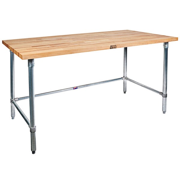 A John Boos wood top work table with a stainless steel base.