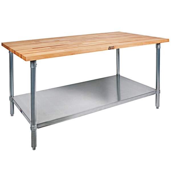 A wood table with metal legs and shelves.