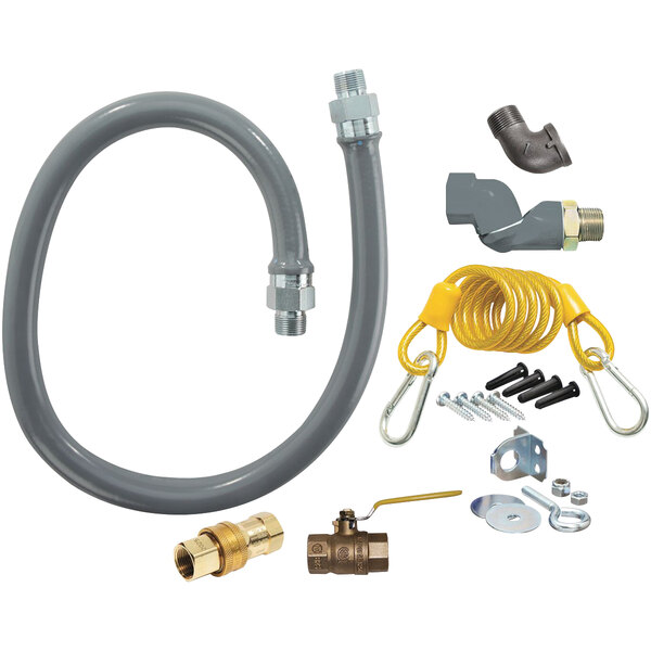 A Dormont ReliaGuard gas hose kit with fittings and tools, including a grey hose with yellow and other parts.