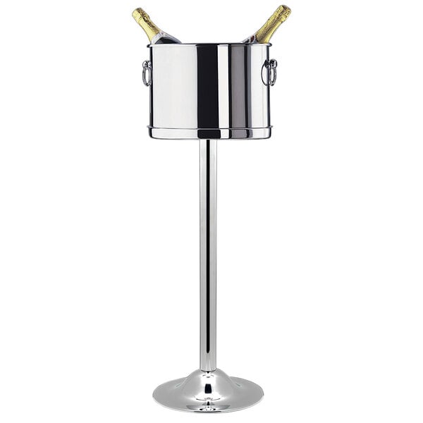 A silver Fortessa metal stand holding two champagne bottles in a stainless steel bucket.