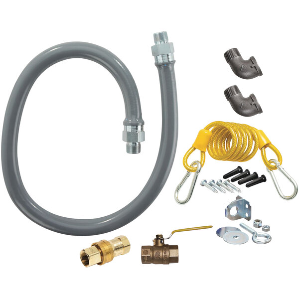 A grey Dormont gas hose kit with yellow cable and fittings.