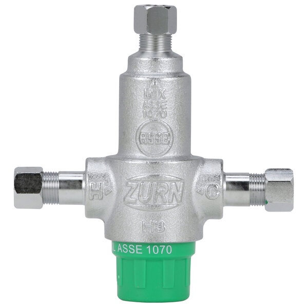A close-up of a silver and green Zurn Aqua-Gard 3 Port Thermostatic Mixing Valve.