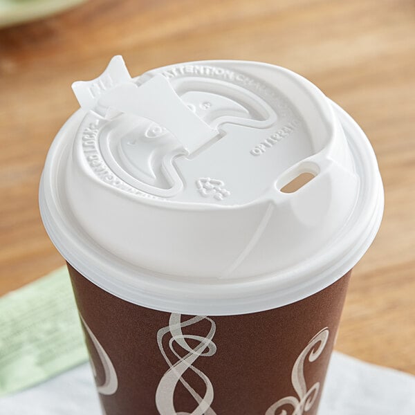 A Dart white Optima ThermoGuard lid on a coffee cup.