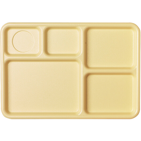 A beige plastic tray with five compartments.