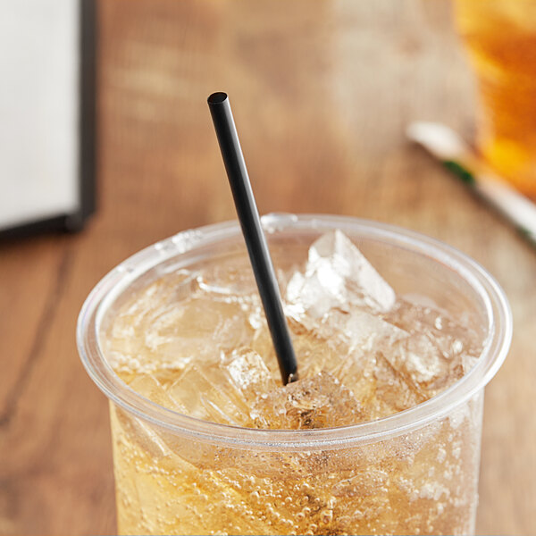 A plastic cup with ice and a black EcoChoice PLA straw.