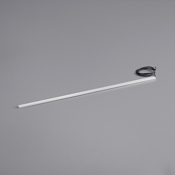 An Avantco LED light strip with a black wire on a gray surface.