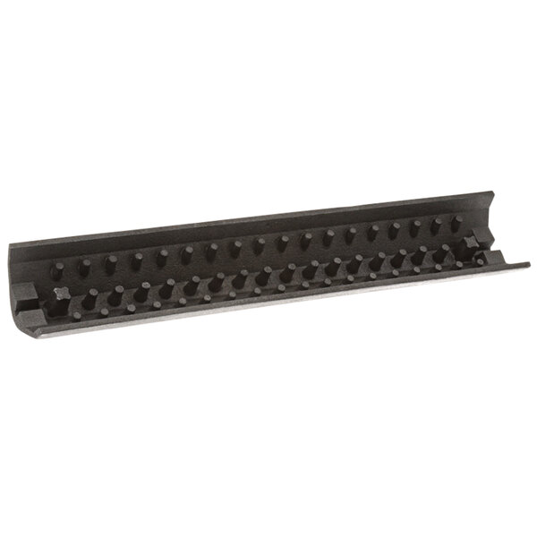 A black plastic cast iron broiler radiant with holes.