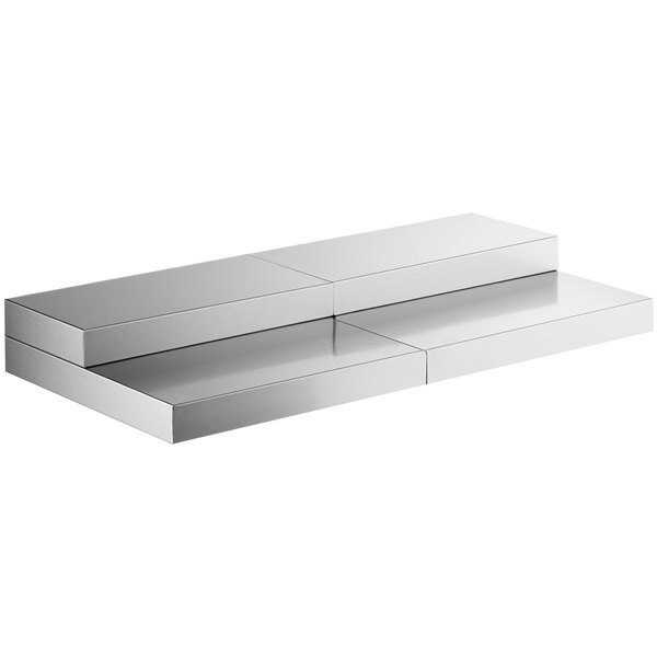 A silver rectangular shelf with two shelves on top.